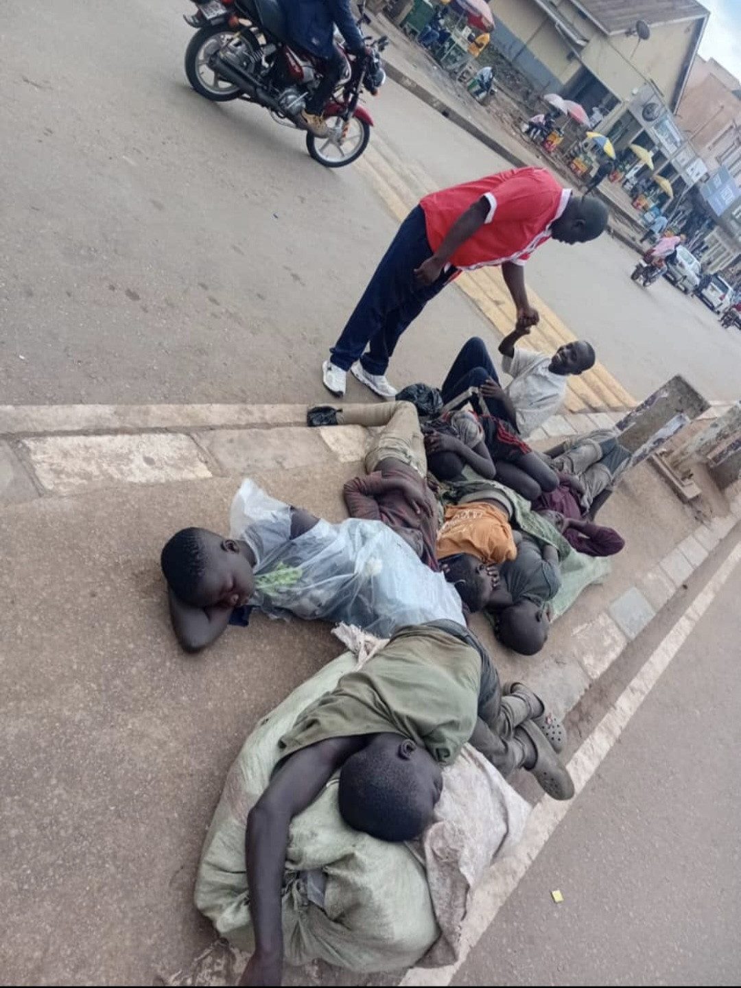 Outreach worker with children